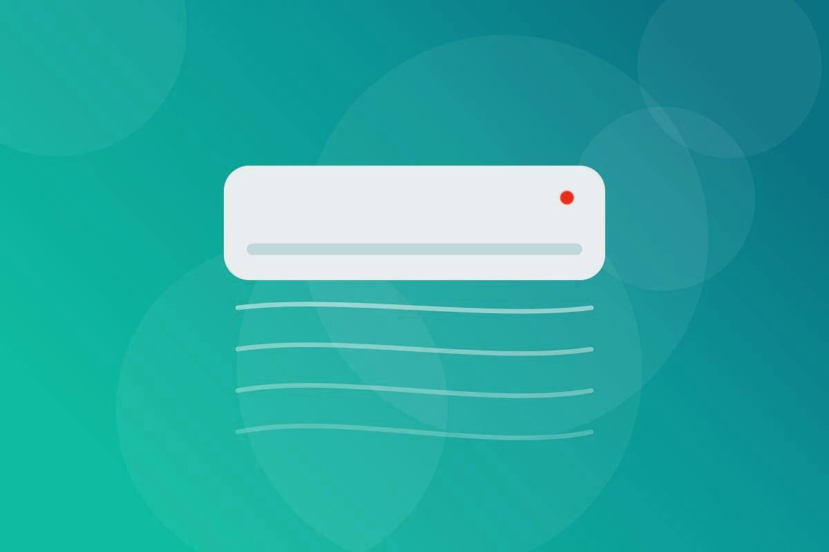 Técnico medindo a pressão do gás de um ar-condicionado com manifold